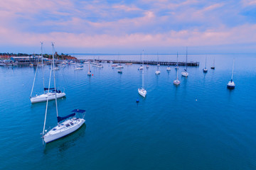 Fototapeta premium Moored boats near Mornington Pier at sunrise