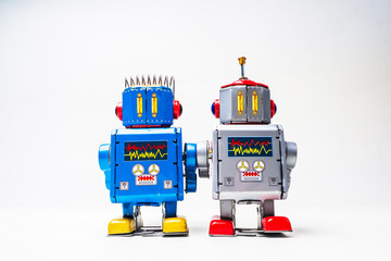 robot tin toy on white background .