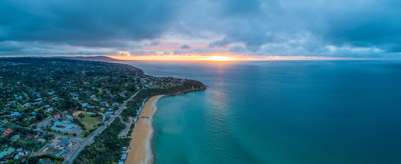 Beautiful ocean coastline at sunset in Melbourne, Australia - aerial panorama