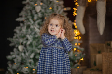 beautiful baby on christmas decorated room