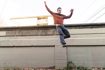 Parkour man jumping high