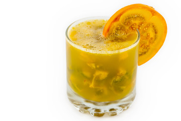 Traditional Colombian beverage made of juice and pieces of lulo (Solanum quitoense) called lulada