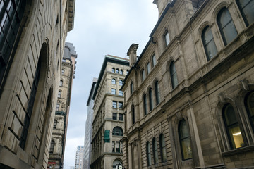 Stone office buildings on narrow city street