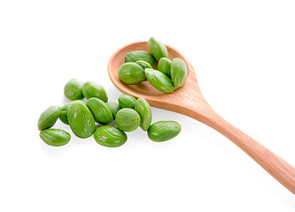 A wooden bowl of Stink Bean, also called Parkia speciosa, Bitter bean, isolated on white background