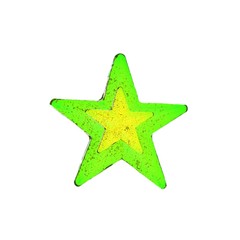 Homemade lollipop. Yellow and green star shaped lollipop isolated.