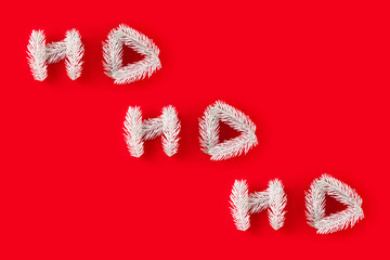 White spruce branches laid out in the form of the phrase 