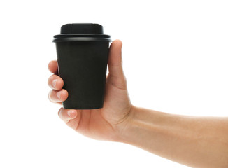 Man holding takeaway paper coffee cup on white background