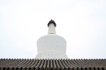 White pagoda architectural landscape in the Beihai Park，Beijing, China