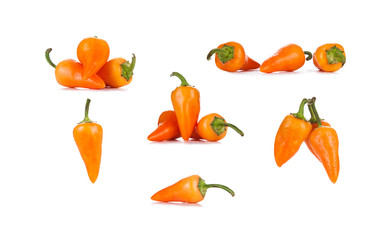 Fresh vegetables Three sweet orange Peppers isolated on white background.