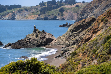 Rocky coves and sandy beaches on the shoreline of Marin Headlands, north San Francisco bay area, California