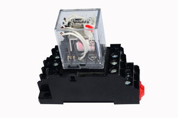 Electrical auxiliary relay in transparent plastic cases and black socket on white background