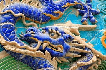 Fototapeta premium The Nine-Dragon Wall (Jiulongbi) at Beihai park, Beijing, China. The wall was built in 1756 CE
