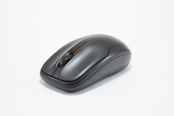 Black wireless mouse on white background