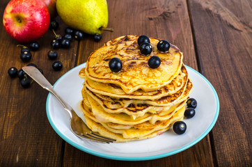 Sweet american pancakes with berries and fruits