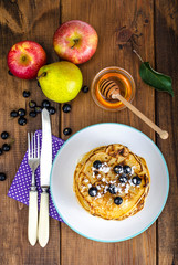 Sweet american pancakes with berries and fruits