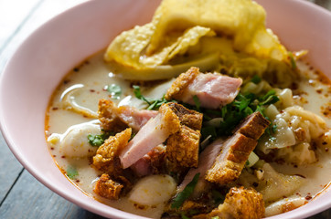 spicy wonton soup with crispy pork