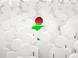 Man with flag of malawi in a crowd