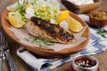 Fried chicken breast with spices
