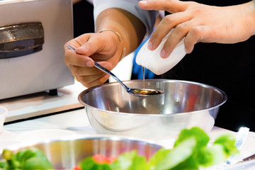Chef preparing food, meal, in the kitchen, chef cooking, Chef decorating dish, closeup, .Chef preparing food, meal, in the kitchen, chef cooking, Chef decorating dish, closeup, .