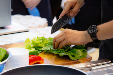 Chef preparing food, meal, in the kitchen, chef cooking, Chef decorating dish, closeup, .Chef preparing food, meal, in the kitchen, chef cooking, Chef decorating dish, closeup, .