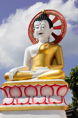 Big Buddha statue at Wat Doi Kham in chiangmai of Thailand 
