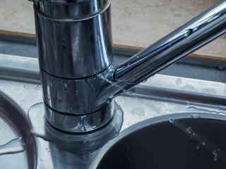 defective faucet close up