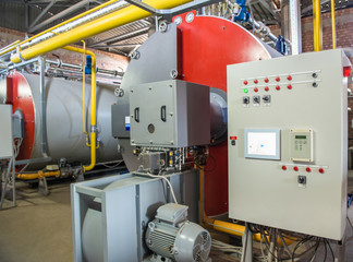 modern industrial boiler room with compressor equipment. control panel
