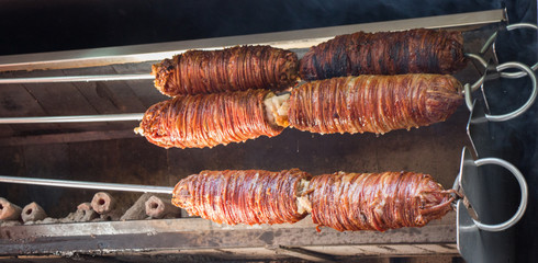 Kokoreç is a Turkish dish made of seasoned, skewered lamb intestines