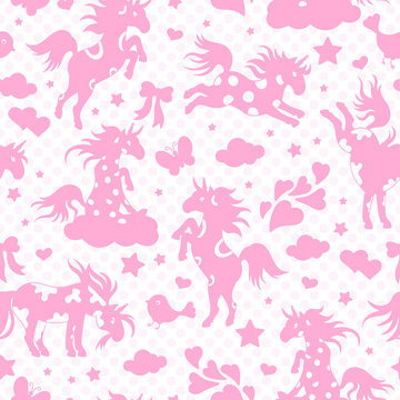 Fototapeta Seamless pattern with funny cartoon unicorns, hearts and stars , pink  silhouette icons on white polka dot background