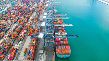 Aerial view cargo container ship loading, container cargo ship in import export and business...