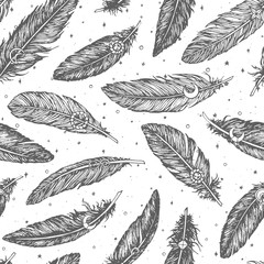 Hand drawn vector seamless pattern with detailed feathers line art on starry white background. Boho decoration for wrapping paper or coloring books. Ethnic illustration.