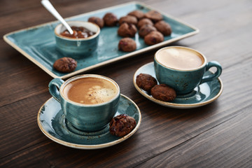 Two cup of coffee and with chocolate cookies