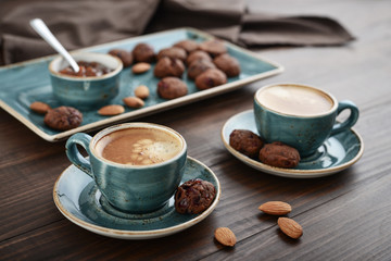 Two cup of coffee and with chocolate cookies