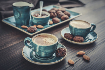 Two cup of coffee and with chocolate cookies
