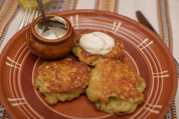 potato pancakes with sour cream