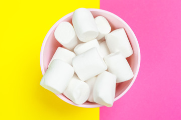 minimal sweet marshmallow on color background