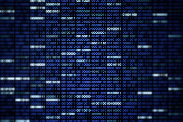 Computer display screen with blue binary code moving in the background. blur defocus blue bokeh light. technology graphic design background concepts