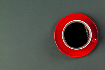Bright colored coffee cup on a table top view