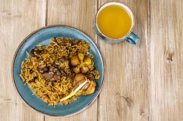 Delicious aromatic pilaf with lamb and garlic