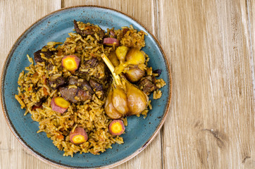 Delicious aromatic pilaf with lamb and garlic
