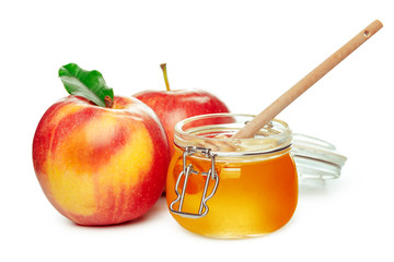 Apples and honey jar for jewish new year holiday isolated on white background