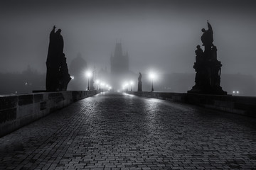 On the famous Charles Bridge in the morning mist, Prague, Czech Republic, Europe