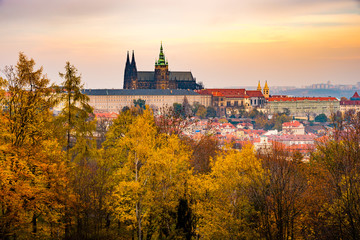Fototapeta na wymiar Beautiful view over Prague historical landmarks in autumn (fall) with yellow and orange leaves, Czech Republic, Europe
