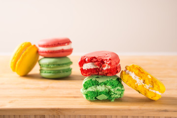 macaroon color cake on a wooden board