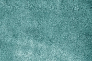 Natural leather surface in cyan color.
