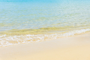Fototapeta na wymiar white sand beach,soft wave,blue ocean,clam sea,beautiful background