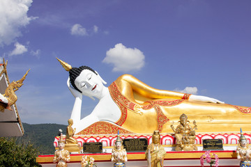 Big Buddha statue at Wat Doi Kham in chiangmai of Thailand 
