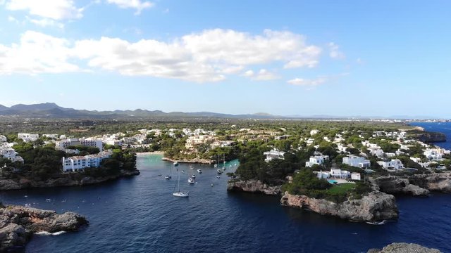 Flight over the bay of Cala D'or and Cala Ferrera in Mallorca