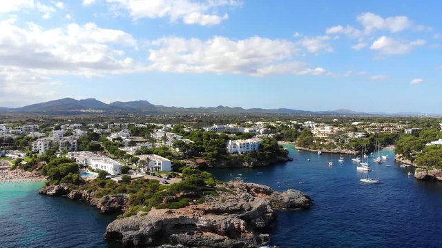 Flight over the bay of Cala D'or and Cala Ferrera in Mallorca