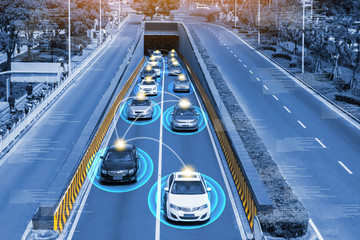 Smart car (HUD) , Autonomous self-driving mode vehicle on metro city road iot concept with graphic...